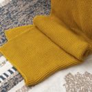 Плед Tkano Essential жемчужной вязки горчичный